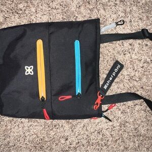 Sherpani Black Backpack with Colorful Accents